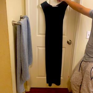 Black maxi short sleeve dress with a high leg slit. Only worn twice